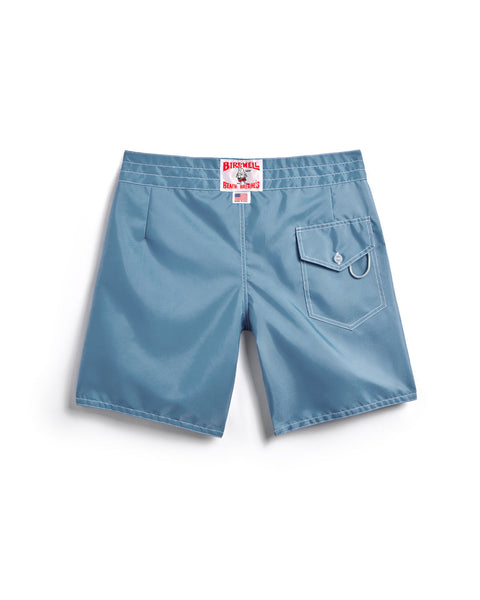 Back View of the 300 Boardshort in Federal Blue with red and white license plate logo and made in usa label on waistband, white key loop and pocket on right side, and white contrast stitching. Product on white background.