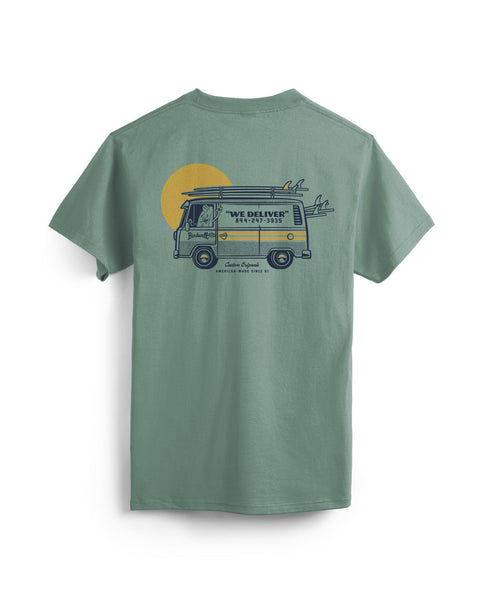 Green t-shirt with a graphic of a van and sun on a white background
