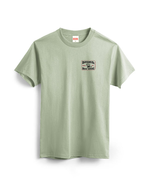 The Hangtag T-Shirt - Desert Green is a garment-dyed heavyweight cotton tee featuring a small 