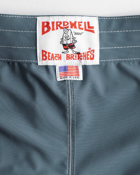 Close up of the waistband with license plate label and made in usa label.