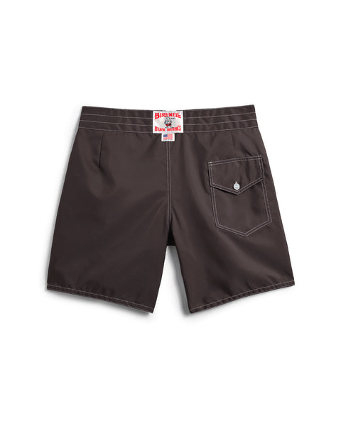 Brown shorts with a visible brand label on a white background