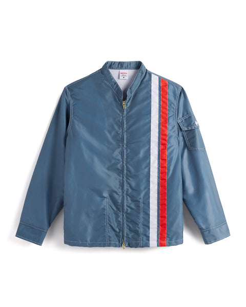 Racing Jacket 25 in Federal Blue with vertical stripes, left stripe is white, white stripe is red. Pocket on left sleeve. New Fleece lining and Talon two way zipper. Product on white background.